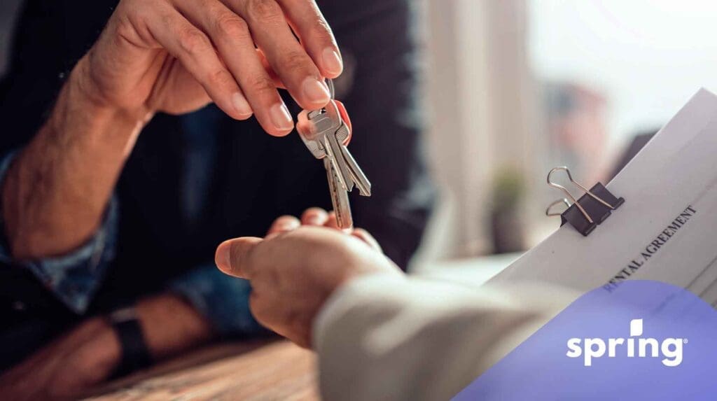 Rental agreement and keys being handed over to new tenant