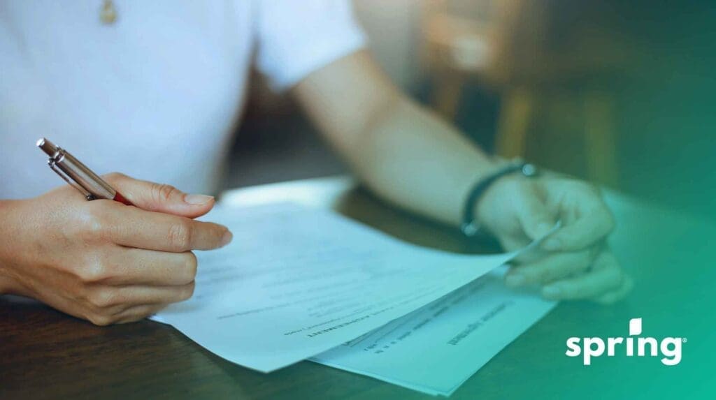 Person filling out CRA form t1213