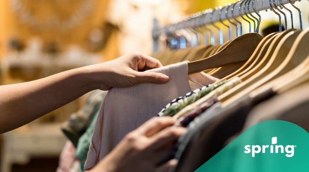 Woman shopping for cheap clothes in Canada