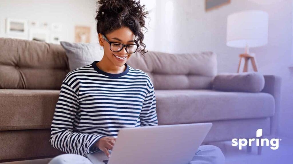 Woman doing peer to peer lending on computer